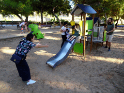 Miaomiao and Max on the slide at the playground at the Parc de Sa Feixina