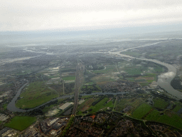 The Oude Maas river, the Kijfhoek marshalling yard and the city of Dordrecht, viewed from the airplane to Rotterdam