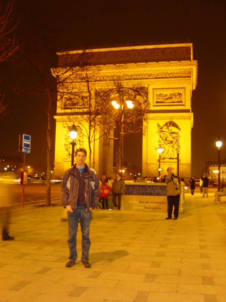 Tim at the Arc de Triomphe, by night