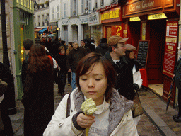 Miaomiao with an ice cream in a street in the Montmartre hill