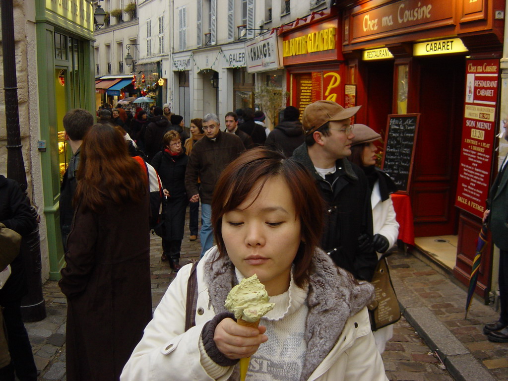 Miaomiao with an ice cream in a street in the Montmartre hill
