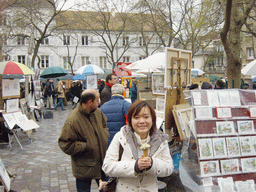 Miaomiao with an ice cream on the Place du Tertre square on the Montmartre hill
