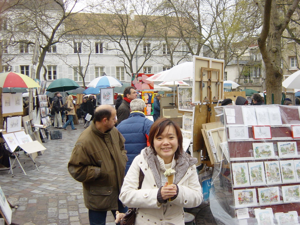 Miaomiao with an ice cream on the Place du Tertre square on the Montmartre hill