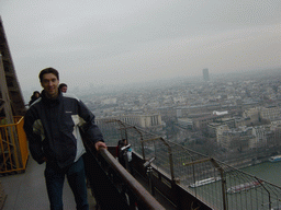 Tim on the higher floor of the Eiffel Tower