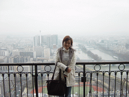 Miaomiao on the higher floor of the Eiffel Tower