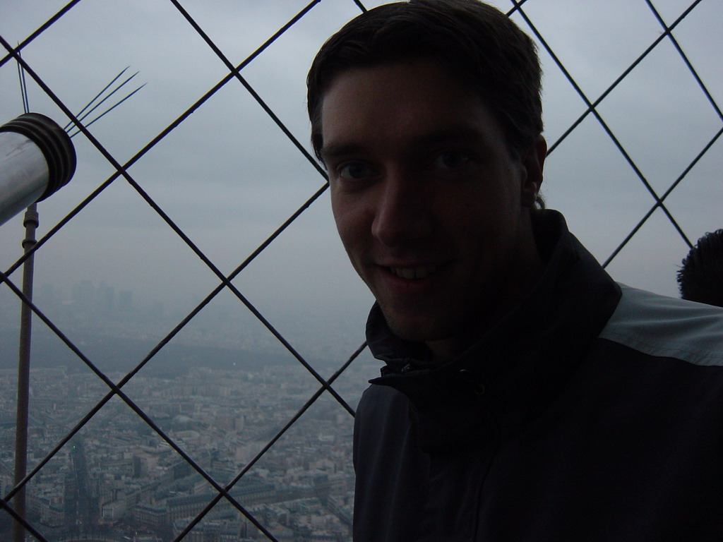 Tim on the higher floor of the Eiffel Tower