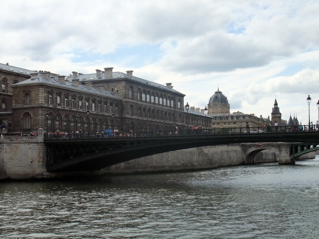 The Tribunal de Commerce, the Conciergerie and the Pont au Change bridge over the Seine river, viewed from the Seine ferry