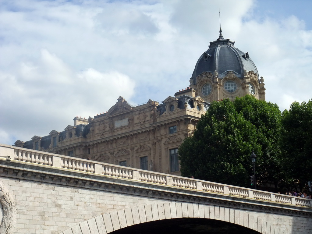 The Pont au Change bridge over the Seine river and the Tribunal de Commerce, viewed from the Seine ferry