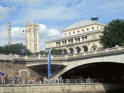 The Fontaine du Palmier fountain, the Théâtre Lyrique, the Saint-Jacques Tower, the Pont au Change bridge over the Seine river and the Bank of the Seine river, viewed from the Seine ferry
