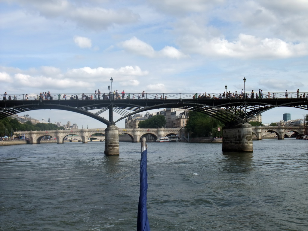 The Pont des Arts bridge and the Pont Neuf bridge over the Seine river, viewed from the Seine ferry