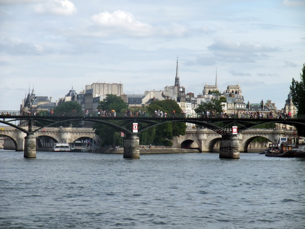 The Pont des Arts bridge and the Pont Neuf bridge over the Seine river, viewed from the Seine ferry