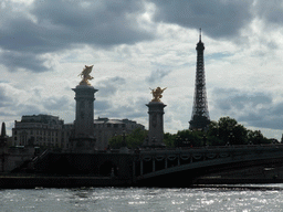 The Pont Alexandre-III bridge over the Seine river and the Eiffel Tower, viewed from the Seine ferry