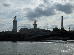 The Pont Alexandre-III bridge over the Seine river and the Eiffel Tower, viewed from the Seine ferry