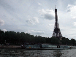 Boat in the Seine river and the Eiffel Tower, viewed from the Seine ferry