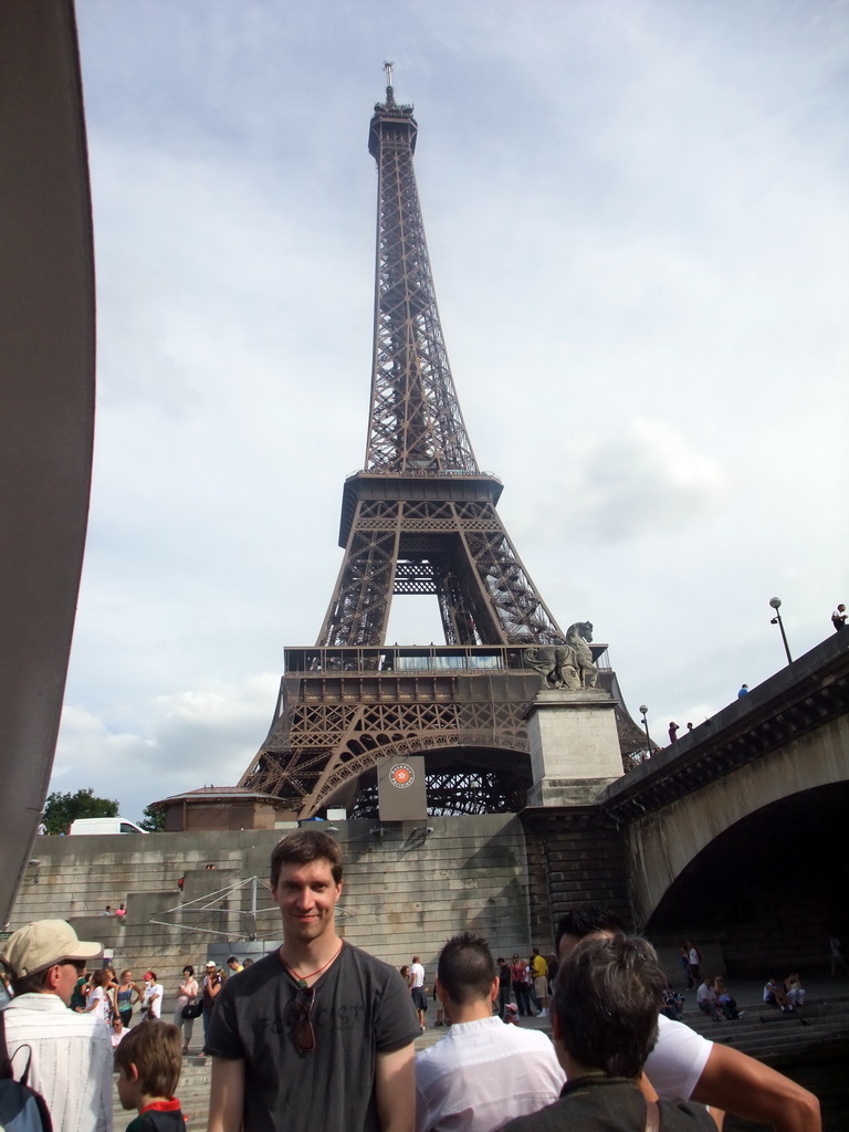 Tim at the Eiffel Tower, viewed from the Seine ferry