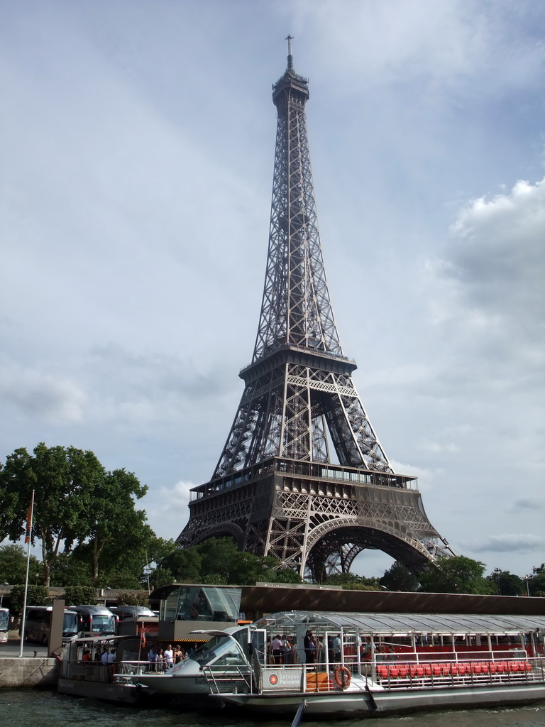 Boat in the Seine river and the Eiffel Tower, viewed from the Seine ferry