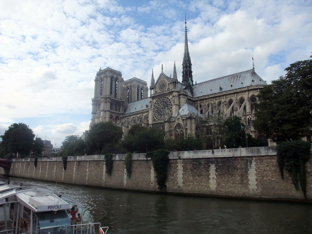 The Seine ferry and the Cathedral Notre Dame de Paris