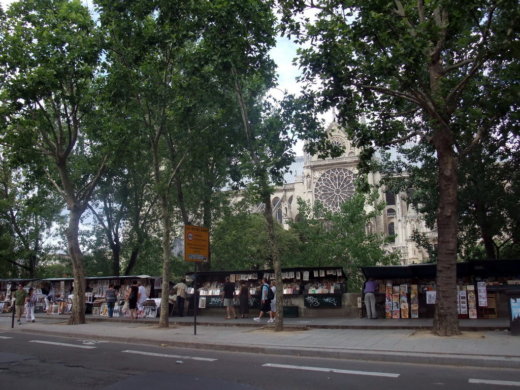 Bookstalls at the Quai de la Tournelle street, and the Cathedral Notre Dame de Paris