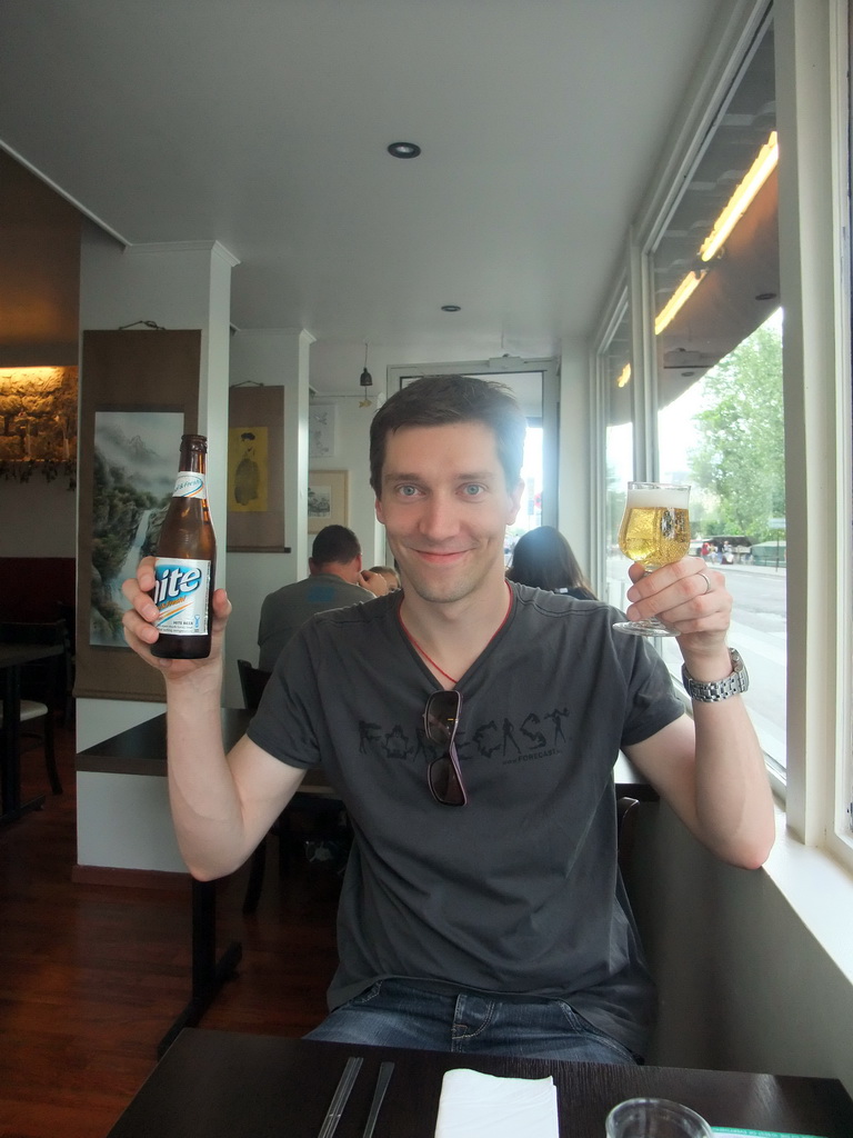 Tim with Hike beer in the Korean restaurant `Koredam` in the Quai de Montebello street