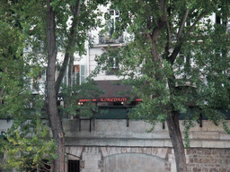 The Korean restaurant `Koredam` in the Quai de Montebello street, viewed from the gardens of the Cathedral Notre Dame de Paris