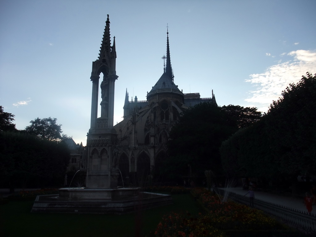 Fountain of the Virgin in the Square Jean XXIII and the back side of the Cathedral Notre Dame de Paris