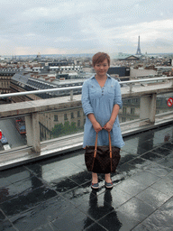 Miaomiao, the Basilique Sainte-Clotilde church, the Hôtel des Invalides, the Église Notre-Dame-de-l`Assomption de Paris church, the Madeleine Church, the Grand Palais and the Eiffel Tower, viewed from the roof of the Galeries Lafayette department store at the Boulevard Haussmann