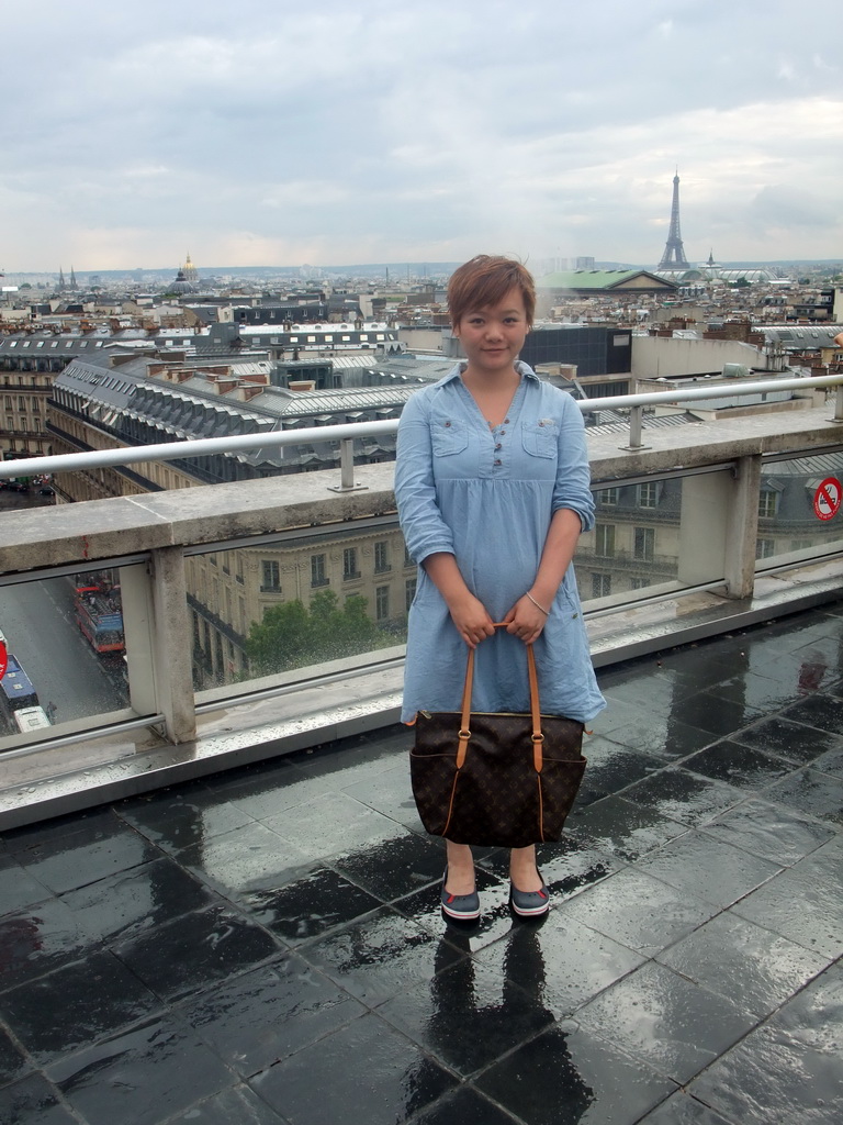 Miaomiao, the Basilique Sainte-Clotilde church, the Hôtel des Invalides, the Église Notre-Dame-de-l`Assomption de Paris church, the Madeleine Church, the Grand Palais and the Eiffel Tower, viewed from the roof of the Galeries Lafayette department store at the Boulevard Haussmann