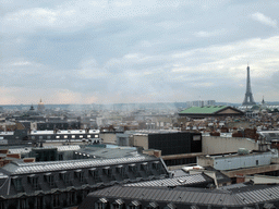 The Hôtel des Invalides, the Église Notre-Dame-de-l`Assomption de Paris church, the Madeleine Church, the Grand Palais and the Eiffel Tower, viewed from the roof of the Galeries Lafayette department store at the Boulevard Haussmann