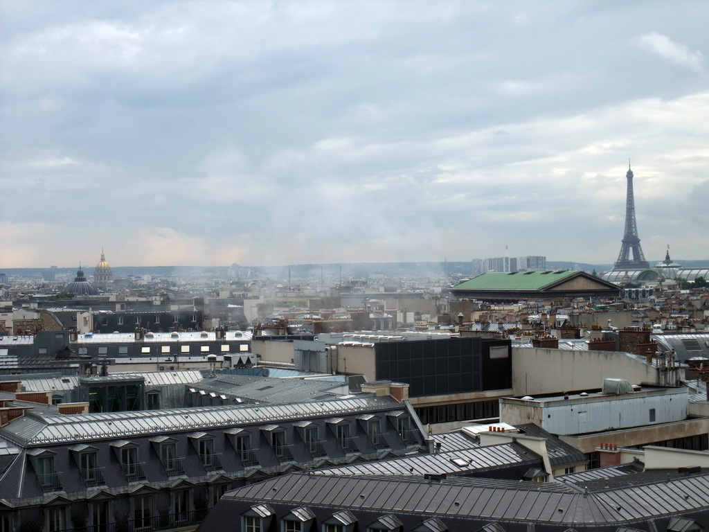 The Hôtel des Invalides, the Église Notre-Dame-de-l`Assomption de Paris church, the Madeleine Church, the Grand Palais and the Eiffel Tower, viewed from the roof of the Galeries Lafayette department store at the Boulevard Haussmann