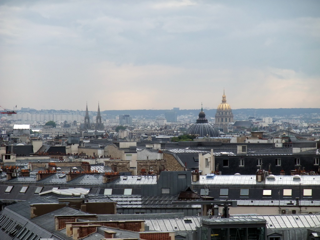 The Basilique Sainte-Clotilde church, the Hôtel des Invalides and the Église Notre-Dame-de-l`Assomption de Paris church, viewed from the roof of the Galeries Lafayette department store at the Boulevard Haussmann