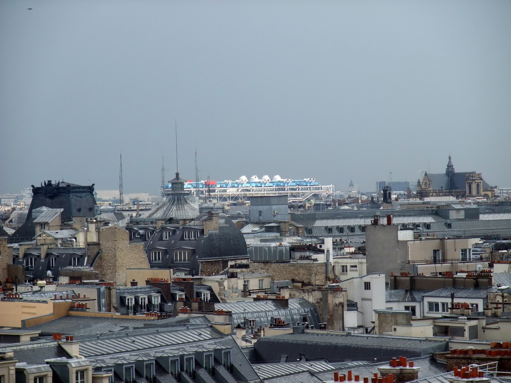 The Centre Georges Pompidou and the Église Saint-Eustache church, viewed from the roof of the Galeries Lafayette department store at the Boulevard Haussmann