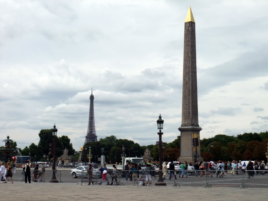 The Place de la Concorde square, with the Obelisk of Luxor and the Fountain of Maritime Navigation, and the Eiffel Tower