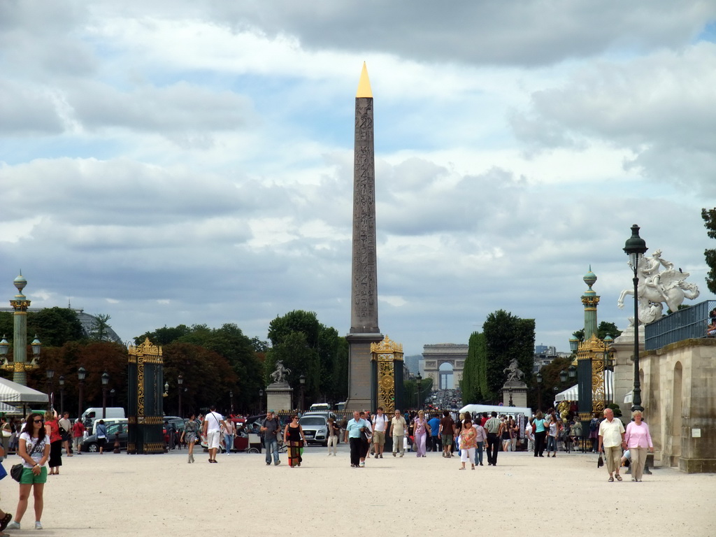The gates of the Tuileries Garden, the Obelisk of Luxor at the Place de la Concorde square, and the Arc de Triomphe