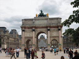 The Arc de Triomphe du Carousel, the Louvre Pyramid at the Cour Napoleon courtyard, and the Louvre Museum