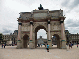 The Arc de Triomphe du Carousel, the Louvre Pyramid at the Cour Napoleon courtyard, and the Louvre Museum