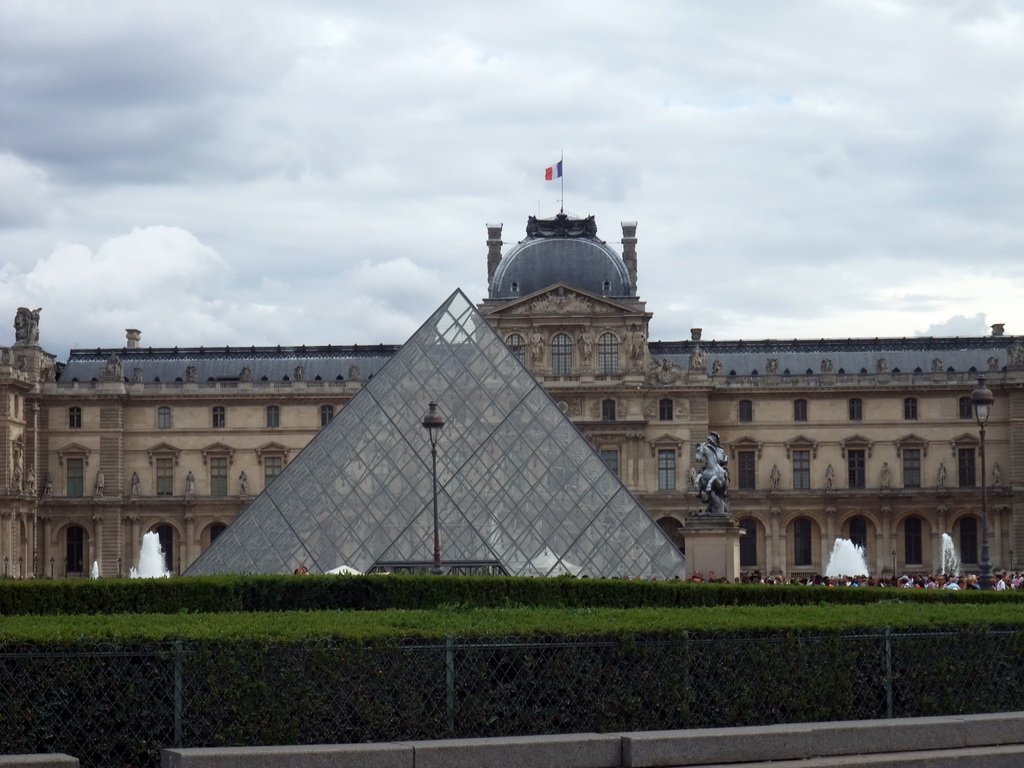 The Louvre Pyramid at the Cour Napoleon courtyard, and the Louvre Museum