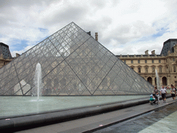 The Louvre Pyramid at the Cour Napoleon courtyard, and the Louvre Museum
