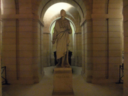 Statue and tomb of Voltaire in the crypt of the Panthéon