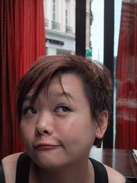 Miaomiao with the Eiffel Tower, in the restaurant `Le Comptoir du Panthéon` in the Rue Soufflot street