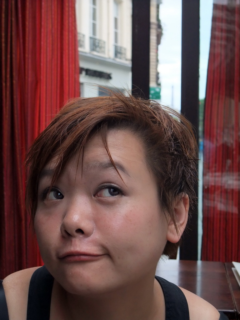 Miaomiao with the Eiffel Tower, in the restaurant `Le Comptoir du Panthéon` in the Rue Soufflot street