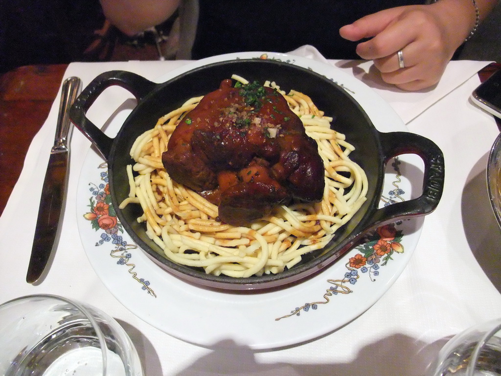 Porc in the restaurant `Maison de l`Alsace` in the Avenue des Champs-Élysées