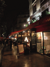 The restaurant `Maison de l`Alsace` in the Avenue des Champs-Élysées, by night