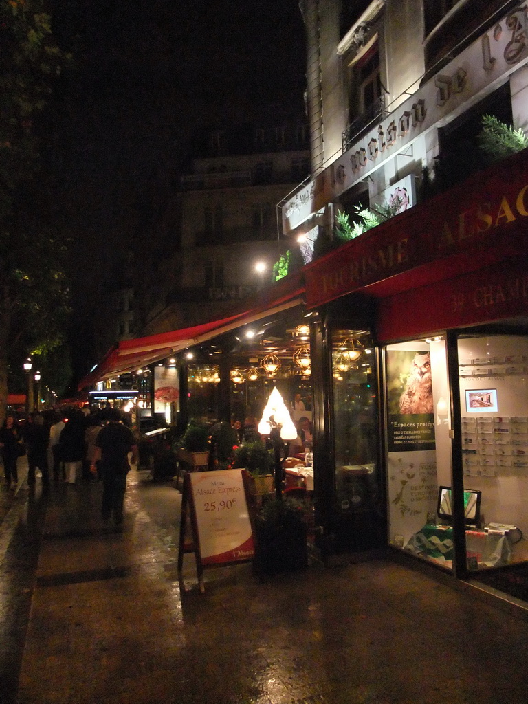 The restaurant `Maison de l`Alsace` in the Avenue des Champs-Élysées, by night