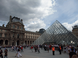 The Louvre Pyramid at the Cour Napoleon courtyard, and the Louvre Museum