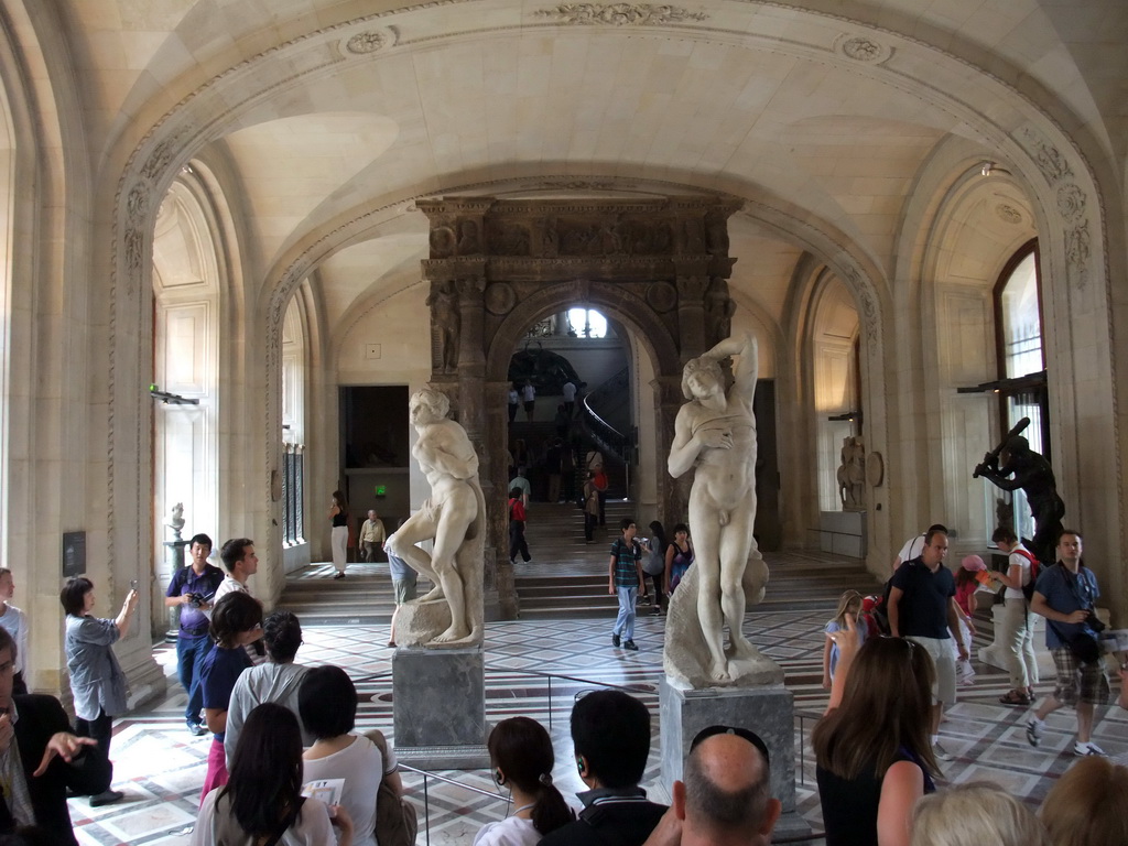 Statues `The Rebellious Slave` and `The Dying Slave` by Michelangelo, in the Galerie Mollien (Michelangelo Gallery) on the Ground Floor of the Denon Wing of the Louvre Museum