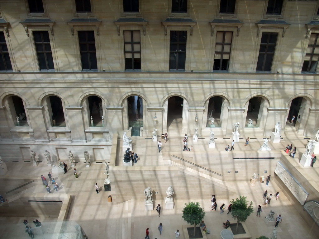 Hall with 18th-19th century French sculptures, on the Ground Floor of the Richelieu Wing of the Louvre Museum, viewed from above