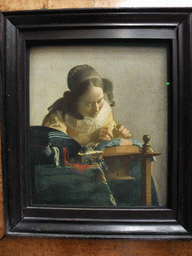 Painting `De Kantwerkster` by Johannes Vermeer, on the Second Floor of the Richelieu Wing of the Louvre Museum