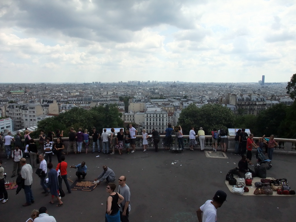 Street vendors on top of the Montmartre hill, with a view on the Montmartre staircase and the region to the south