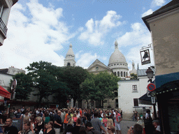 The Rue du Mont Cenis street, the Church of Saint Peter of Montmartre and the Basilique du Sacré-Coeur church