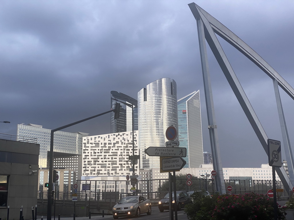 The Pont Léonard da Vinci bridge and skyscrapers at the La Défense district, viewed from the Rue des Étudiants street